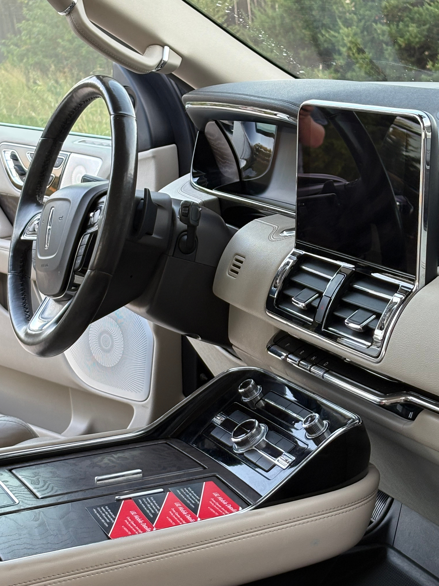 Detailed Lincoln Navigator dash, console and touchscreen after interior cleaning