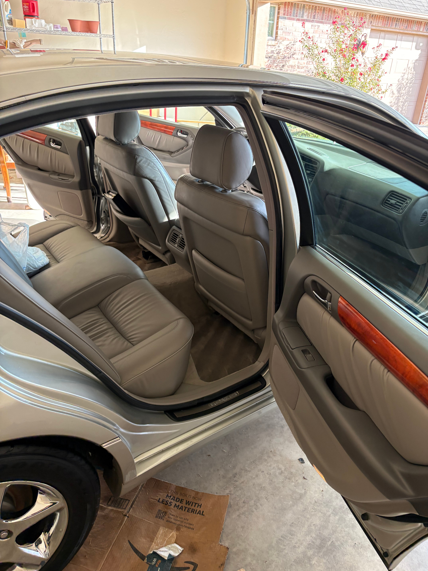 Spotless rear leather seats and carpet in a detailed Lexus sedan