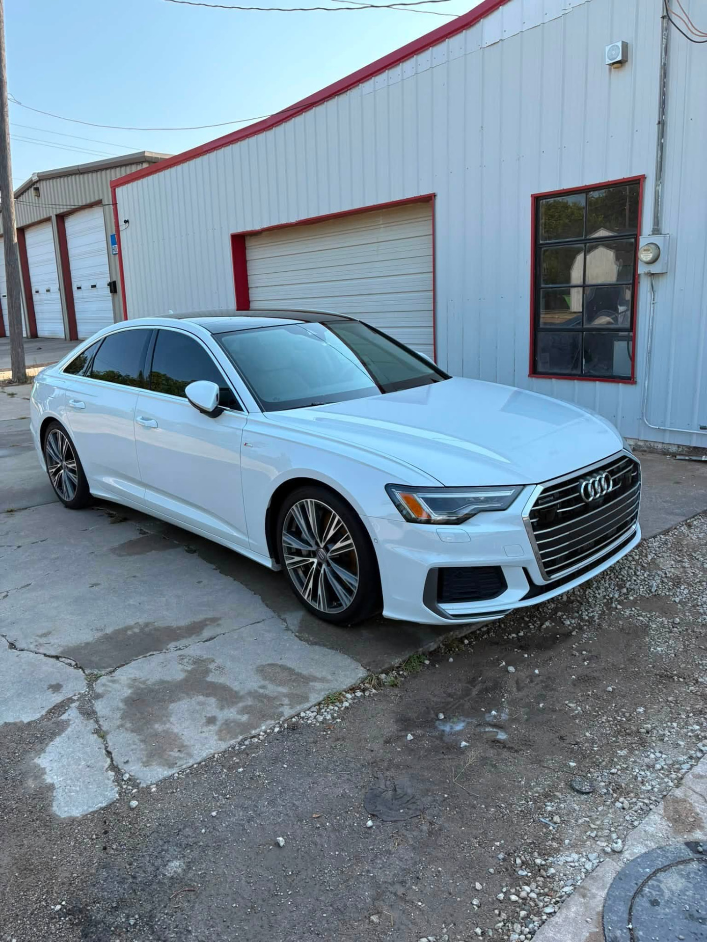 White Audi A6 S-line after a full detail in Prague, OK, with glossy paint and clean wheels